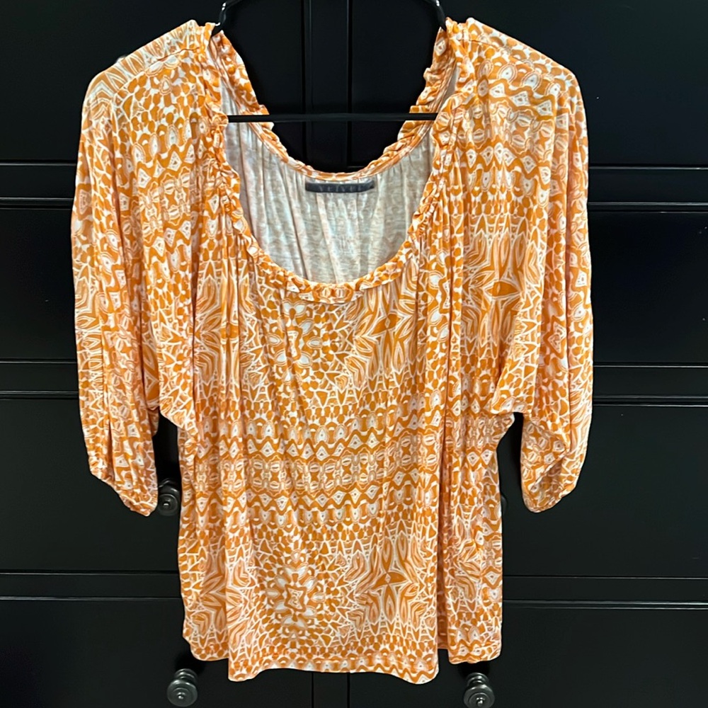 Velvet brand orange and white peasant style women’s top. Size medium.